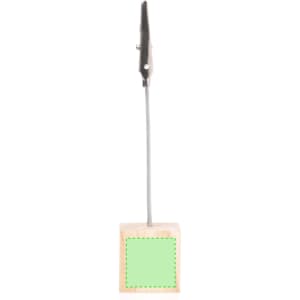 A wooden clip holder with a silver metal clip on a flexible wire, featuring a blank green block base.