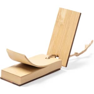A bamboo notepad with a tied string closure and a fold-over cover. The exterior features a natural wood finish.
