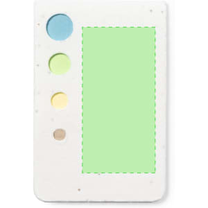 A sticky notepad featuring a light green section and coloured circular markers in blue, lime green, yellow, and brown.