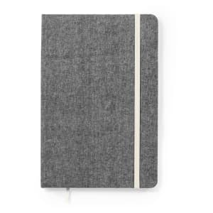 A grey notepad with a textured cover and an off-white elastic band. The notepad includes a logo on the front.
