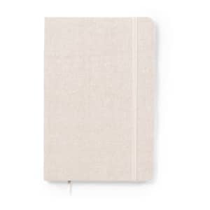 A notepad with a light beige cover and an elastic band, featuring a logo on the front.