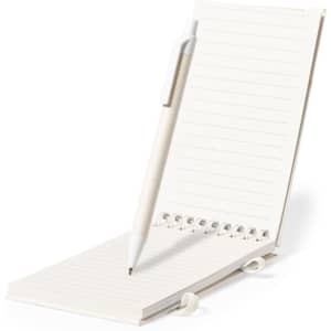 A white notebook with lined pages, featuring a pen resting on it. The notebook has a spiral binding.