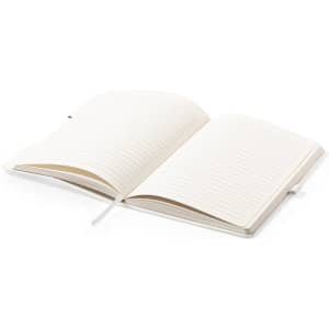 An opened white notebook with lined pages and a ribbon bookmark, featuring a logo on the cover.
