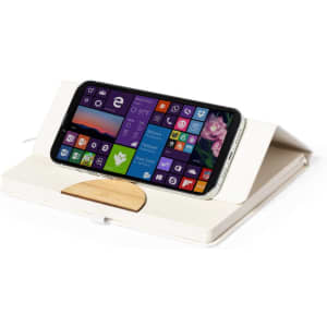 A cream notebook holder with a wooden stand, featuring a smartphone displaying a vibrant screen.