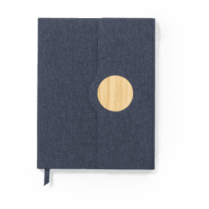 Aqua Notepad in navy blue with a circular wooden accent and a ribbon bookmark. Features a textured cover.