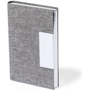 A grey fabric-covered business card holder featuring a silver branding area. It stands upright on a white background.