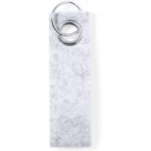 A grey keyring made of felt with two metal rings attached at the top.