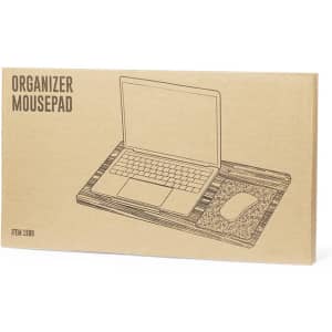 A brown packaging for the Krit Organizer Mousepad featuring an illustration of a laptop and mouse setup.