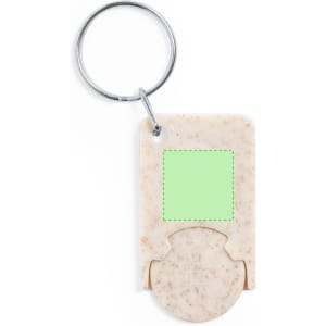 A cream-coloured keyring coin with a circular attachment and a blank green area. It has a metal keyring.