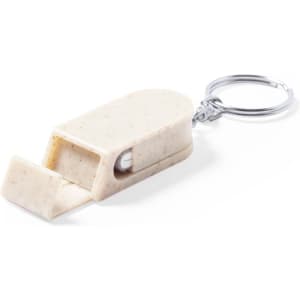 A beige whistle keyring with a silver metal keyring attached. The design is simple and compact.