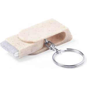 A beige Peix Holder Keyring with a silver keyring attachment and a textured surface.
