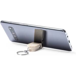 A keyring holder in a neutral tone, designed to support a smartphone in an upright position. Features a metal keyring.