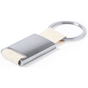 A silver keyring with a rectangular metal attachment and a beige fabric strap. It features a circular keyring section.