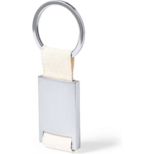 A silver keyring with a rectangular metal tag and a fabric loop in cream. It features a logo on the tag.