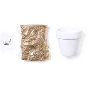 A white flowerpot, a pack of soil, and a sachet of seeds, arranged neatly.