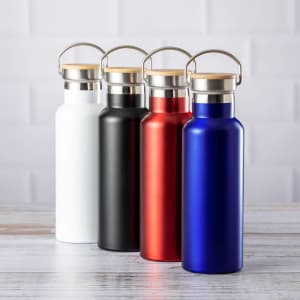 A drink bottle collection featuring a white, black, red, and blue insulated flask with metal caps and handles.