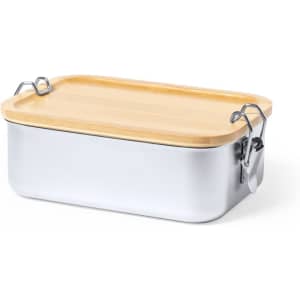 A silver lunch box with a wooden lid and metal clips, featuring a sleek, rectangular design.