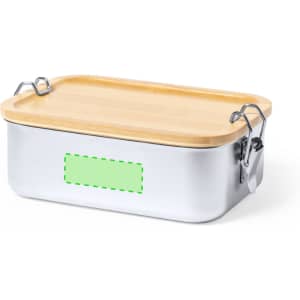 A lunch box made of stainless steel with a bamboo lid and metal clasps. It features a green label area.