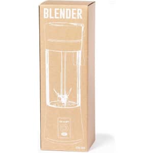 A drink bottle blender in a brown cardboard box, featuring a transparent body and an on/off button design.