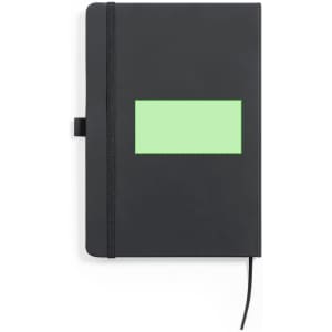 A black notepad with a green rectangular area and an elastic band closure. It has a logo on the cover.