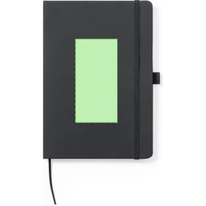 A black notepad with a rectangular cut-out featuring a bright green backing and an elastic closure.