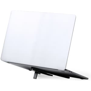 A black phone stand adjusts to support devices, featuring a sleek white surface and a sturdy base.