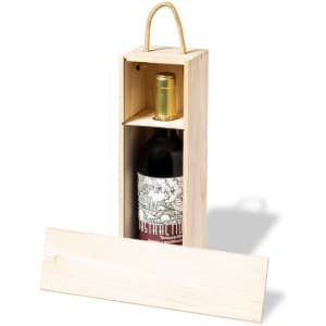 A wooden gift box with a handle containing a red wine bottle, showcasing a detailed label.