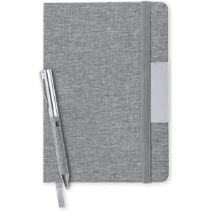 A grey notebook with a pen resting beside it. The notebook features an elastic closure and a pocket on the cover.