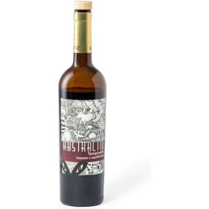 A drink bottle with a brown glass body, a wooden cork, and a colourful label featuring intricate designs.