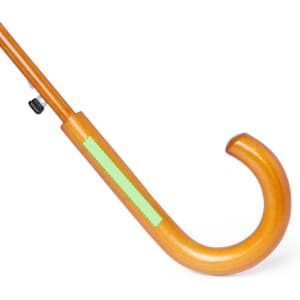 A wooden cane with a curved handle, featuring a bright green accent on the shaft.