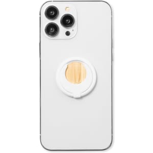 A white phone with a circular wooden phone holder attached to the back, featuring a logo.