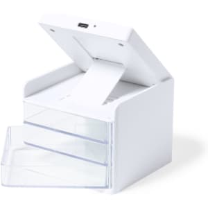 A white charger organiser with two transparent drawers and a lid that opens from the top, featuring a USB port.