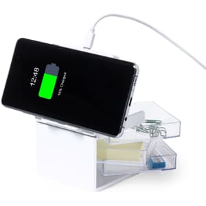 A white organiser charger with drawers holds a smartphone displaying a charging battery icon.