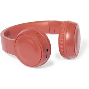Coral headphones with a padded design and built-in control buttons, featuring a logo on the side.