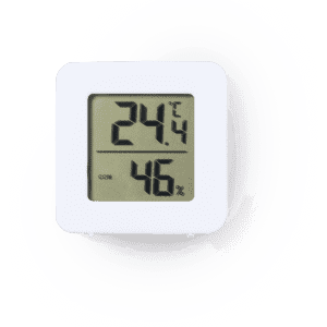 A white digital weather station displaying temperature and humidity levels.