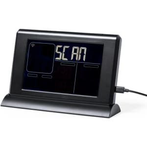 A black digital weather station with a stand, featuring a large display and a charging port.