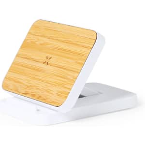 A wireless charger with a bamboo top and white base, featuring a sleek, modern design and a logo.