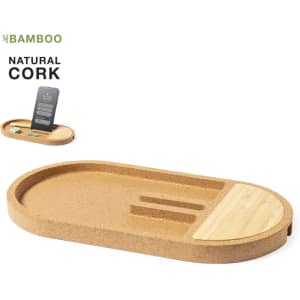 A natural cork wireless charger with an oval design, featuring slots for a phone and accessories, alongside a bamboo accent.
