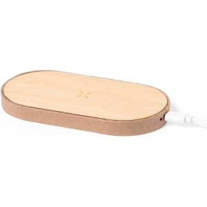 A wireless charger with a bamboo top and a brown base, featuring a logo on the surface.