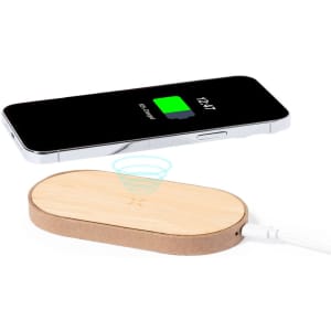 A wireless charger in a wood finish with a phone displaying a charging icon. The charger has a logo on it.