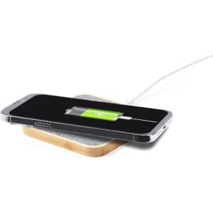 A wireless charger in a wooden base with a smartphone displaying a battery charging icon.