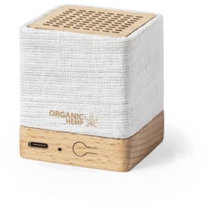 A compact speaker in white fabric and wooden base, featuring a logo and a USB-C port.