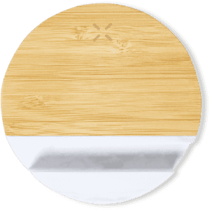A round wireless charger holder in bamboo and white, featuring a simple design with a minimalist aesthetic.