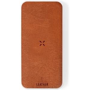 A brown leather power bank features a smooth texture and a branded logo on the front.