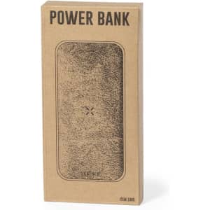 A power bank in a brown cardboard package with a textured design and a logo. The item is leather-like in appearance.