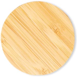 A round wooden serving board with a smooth, light timber finish and natural grain patterns.