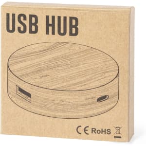 A round wooden USB hub in a cardboard packaging with a minimalist design and a logo.