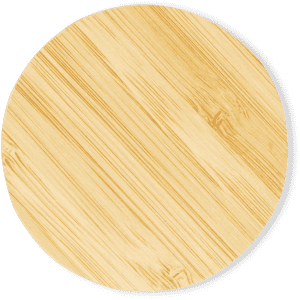 A round bamboo serving board with a smooth, natural wood finish and visible grain patterns.