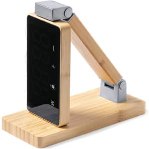 A multifunction alarm clock with a bamboo base and an adjustable display, featuring a sleek, modern design.
