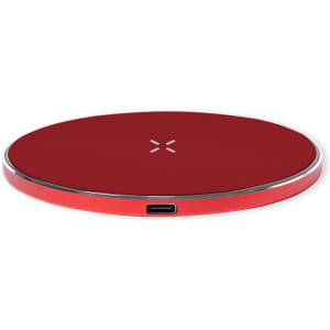 A red wireless charger with a circular design and a USB-C port on the side. It features a subtle logo.